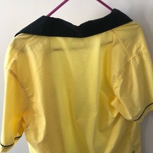 Yellow button up shirt